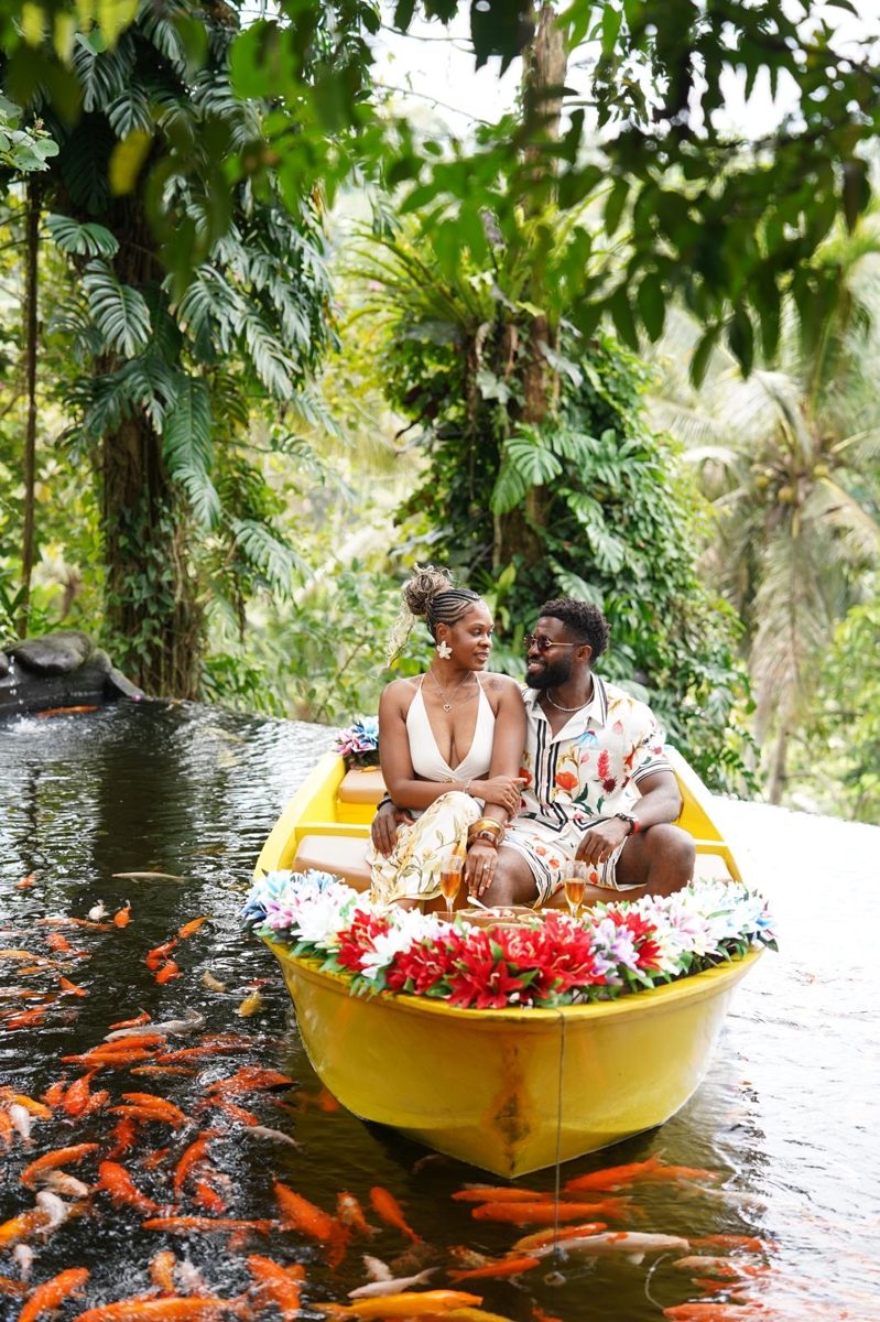 Flower boat under jungle canopy